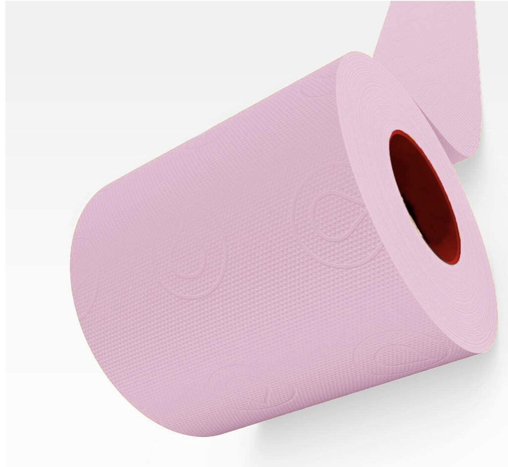 Roll of pink toilet paper. 