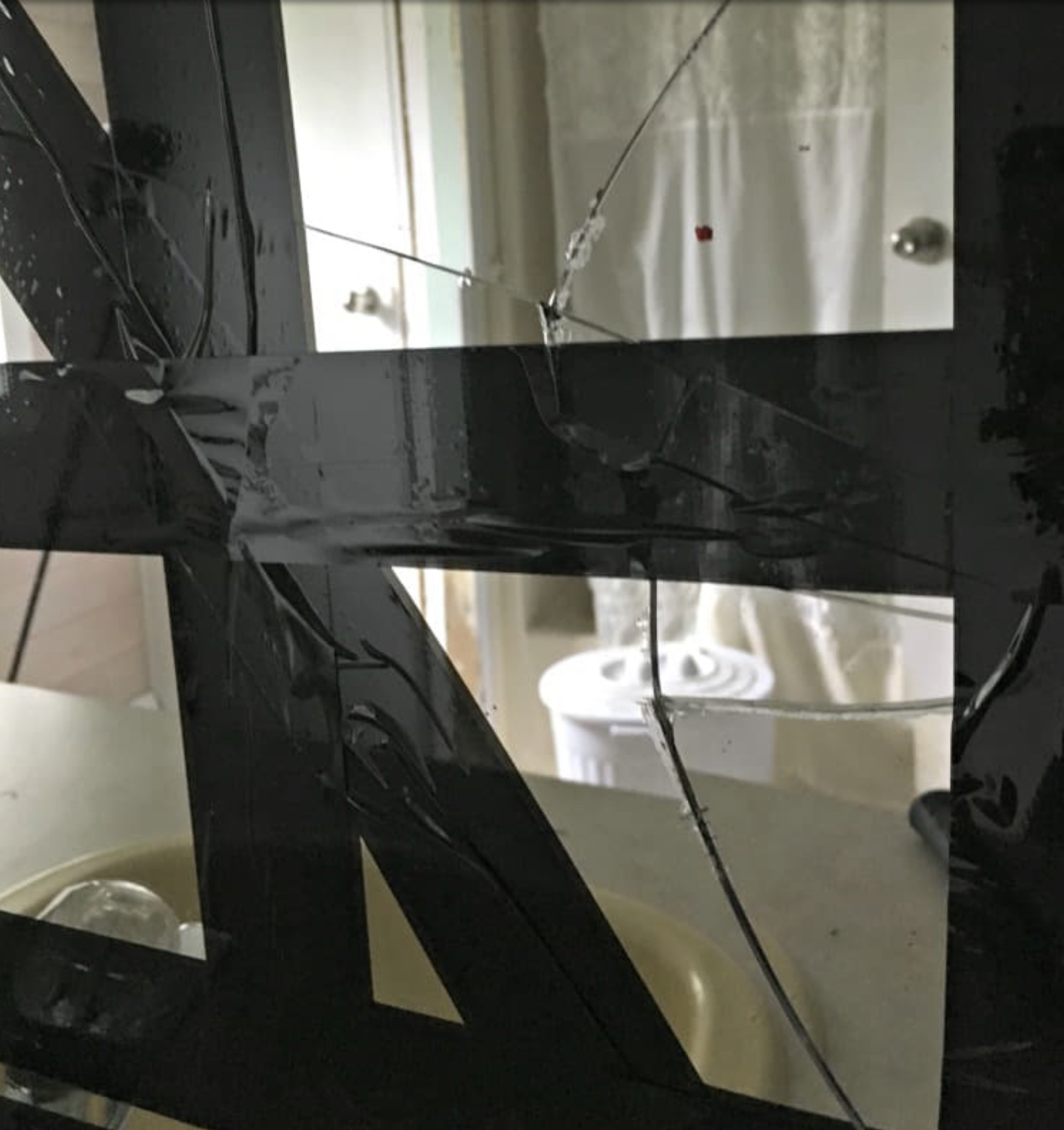 How to Remove a Builder Grade Bathroom Wall Mirror - Lockdown Loo