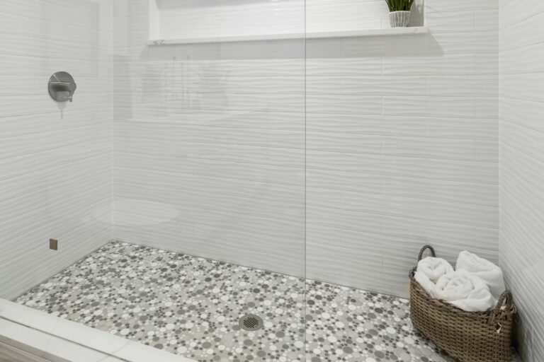 7 Pebble Shower Floor Pros, Cons [River Rock Problems] Lockdown Loo