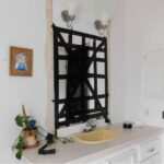 How to remove a builder grade mirror from a bathroom
